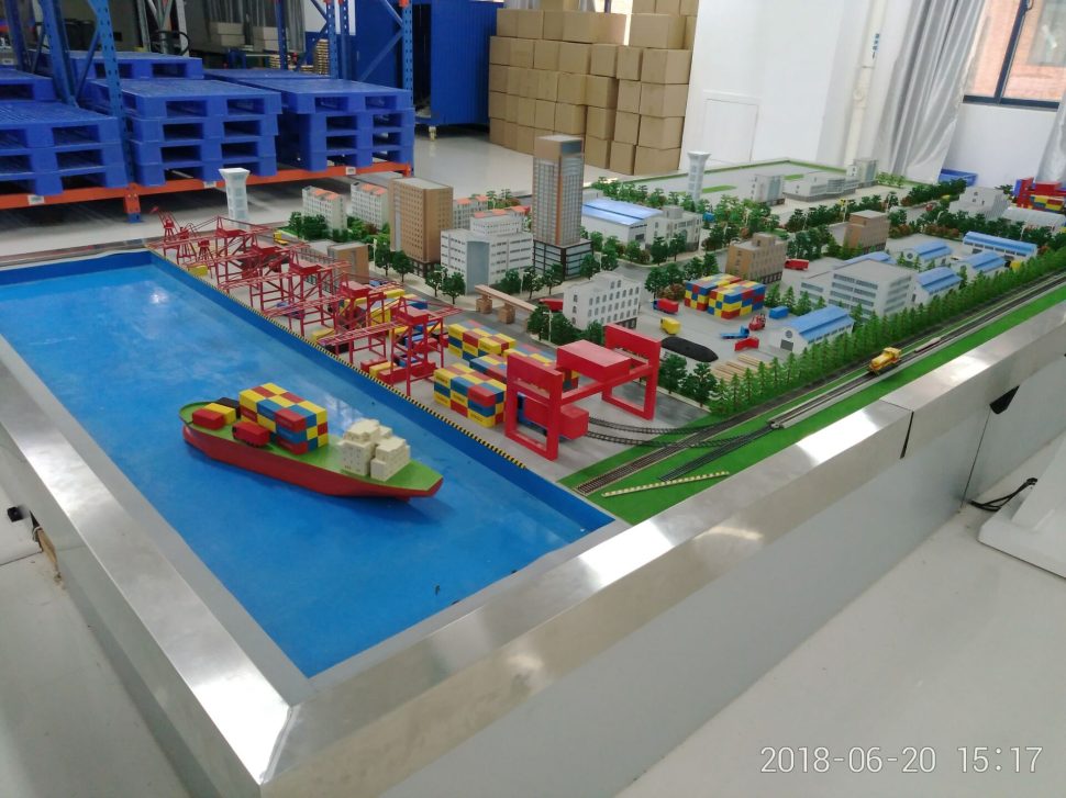 Port logistics model with cranes, quay and a moored vessel